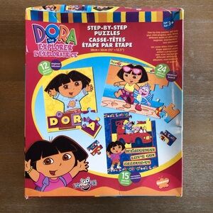 Dora the Explorer Puzzles Step-by-step Ages 3+ Dora L'Exploratrice casse-têtes
